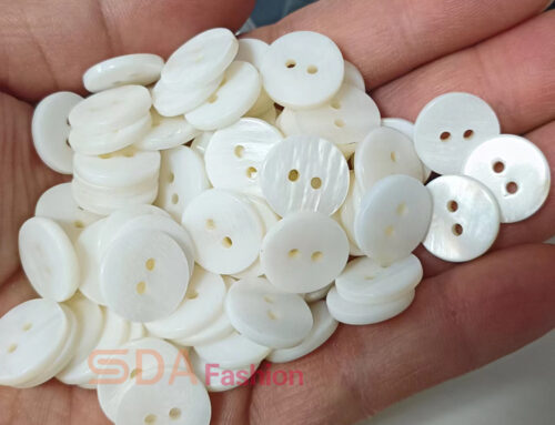River shell button in double white color, flat shape